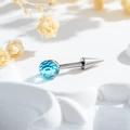 F136 titanium piercing stud featuring a blue zircon ball and silver cone spike tip - Aqua