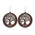 Macro detail of round hollow wood earrings with Tree of Life engraving and silver hooks - Style 53