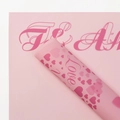 Waterproof pink floral wrapping paper featuring romantic heart prints and Love text - Heart Language - Pink