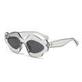 Grey transparent wavy frame sunglasses with smoke lenses and gold star hardware - Translucent Grey Frame Grey Lens