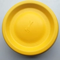 Durable bright yellow round plastic dog flying disc with textured finish and bone logo - 21cm Diameter Flying Disc