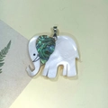 Detail of elephant pendant with white shell body and colorful abalone shell ear accent - C10728-White MOP & Abalone Ears (Elephant)