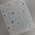 Self-adhesive laser nail art stickers M-164 featuring stars, moons, and hearts motifs - Holographic (M-164)