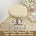 Elastic beige waffle knit round stool cover shown in two sizes 25-30cm and 30-36cm - Beige
