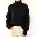 Close-up of the black cable knit texture and high collar detail of the long sleeve sweater - 3XL / Black Turtleneck