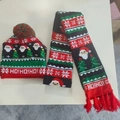 Close-up of LED Christmas knit hat and scarf set with Santa and HO!HO!HO! patterns - 3 Santa Heads-Set