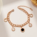 Double-layered 18K gold plated titanium bracelet featuring Roman numeral shell pendants - Rose Gold