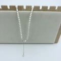 Detail of white round pearls necklace with S925 silver clasp on velvet jewelry display - 925 Sterling Silver 4mm (38+4cm)