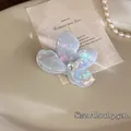 Elegant 5.5cm butterfly hair claw clip with iridescent finish and single rhinestone accent - Light Purple Small Flower
