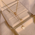Elegante goldene Doppelhalskette mit Herzanhänger und Zirkon-Zylinder in Schmuckdose - Gold Quaste Herz