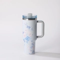 Detail of insulated tumbler with handle featuring pink roses and blue leaves on light blue - 1L / Blue Rose Floral (Style 3)
