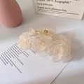 Elegant beige fabric flower shark hair clip with metal tassel and pearl accents - Pale Champagne Camellia