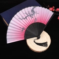 Classic folding fan with pink gradient plum blossom pattern and black carved bamboo ribs - Multicolor Pattern No.69