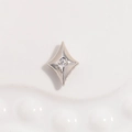 Close-up of S925 sterling silver four-point star bead with a small white zircon stone - Style A: Platinum Flat Rhombus Bead
