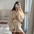 Two-piece cream cotton muslin lounge set with long-sleeved button shirt and ruffled shorts - S / Apricot