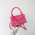 Fuchsia ruched faux leather crossbody bag with double knot handle and gold hardware - Pink