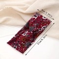 Flat lay of floral twist headband showing measurements 9cm width and 21cm length - Red Floral
