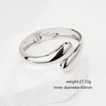 Minimalist silver geometric water drop bangle displayed on white rock aesthetic prop - Minimalist Shiny Silver Open Bangle (SL230) / Silver