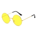 Vintage round sunglasses with yellow ocean lenses and a gold metal frame on white background - Gold Frame Yellow Lenses