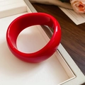 Polished bright red acrylic resin wide open bangle with a smooth geometric design - Red