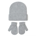Close-up of grey knitted winter hat and matching mittens set on white background - Light Gray