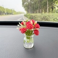 Car dashboard ornament featuring a glass vase with red flowers and Good Luck label - Red Gypsophila