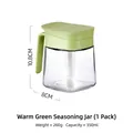 Portaspezie in vetro verde caldo con maniglia dorata sul coperchio e cucchiaio bianco - 1 Pezzo / Verde Caldo