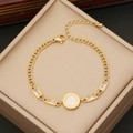 Golden stainless steel square zircon necklace displayed in a beige jewelry gift box - Gold Bracelet