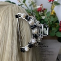 Silver metal hair claw clip featuring black and white beads on blonde hair - Obsidian Deep Sea Pearl Silver Hair Claw