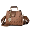 Brown monogram crossbody bag for women with golden leaf charm and chain strap - Earthy Yellow