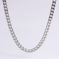 Detailed view of polished silver cuban link chain with high mirror finish metal texture - 5mm Steel Color
