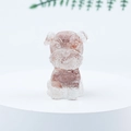 Miniature Schnauzer figurine in clear and reddish-brown crystal resin seated on a white stand - 49 Hematoid Quartz