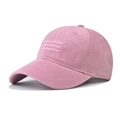 Close-up of pink cotton baseball cap featuring white embroidered letters and twill fabric - Three Rows of Small Letters / Pink