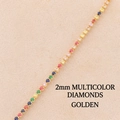Collier tennis arc-en-ciel doré 2mm avec zircons colorés sur fond de texture beige - Zircon Arc-en-Ciel (2mm) - Plaqué Or