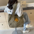 Olive green canvas tote bag with yellow clover patch and vintage frayed edges - Raw Edge Clover Patch Style / Army Green