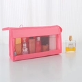 Pink mesh travel toiletry bag with zipper and sturdy handle for cosmetics storage - Pink