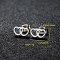 Polished stainless steel double heart studs showing dimensions 1cm x 0.5cm on black - 027 Double Heart / Steel