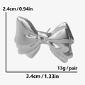 Detailed size map of silver bow stud earrings showing dimensions 3.4cm width and 2.4cm height - Silver