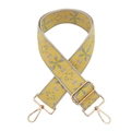Detail of embroidered floral pattern and gold metal hooks on woven shoulder bag strap - Silver Clasp / Bright Yellow Green Floral