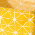 Foldable canvas laundry basket in yellow with white geometric star pattern detail - Yellow Branches