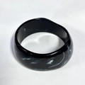 Wide irregular resin bangle featuring black and white marble pattern in a polished finish - Inner Diameter 67.2mm / Weight 67g / Black Brushed