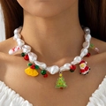 Festive Christmas necklace with pearls, snowman and Santa pendants on model - Multi Christmas Elements Pendants Style / White