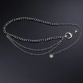 Detail of multilayer silver metal waist chain with celestial sun and moon pendants - Silver Single Moon Multi-layer