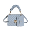 Light blue quilted crossbody bag with heart-shaped gold lock and cloud handle - Blue