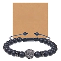 Macro detail of men's matte black stone bracelet with lion head and brother greeting card - To My Brother