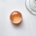 Amber translucent crystal ball phone grip with smooth resin surface and glossy finish - K7 Orange Transparent Ball