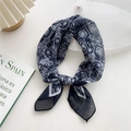 Dark blue vintage mandala print square scarf tied in a stylish knot on a white tray - Water Drop Black