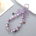 Lilafarbene Kristallperlen Handykette mit Doppelkette Schmetterlingsschleife und Silberverschluss - Violette Perlenblume (K4663)