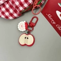 Dettaglio portachiavi natalizio con Babbo Natale, ciondolo mela e biglietto augurale - Portachiavi Mela Babbo Natale