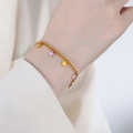 Bracciale con ciondoli a stella in oro e smalto rosa con elegante design a catena - Bracciale / Smalto Viola Oro (E435)